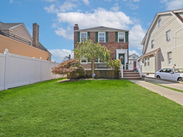 3 BR, 1.50 BTH Colonial style home in Belle Harbor